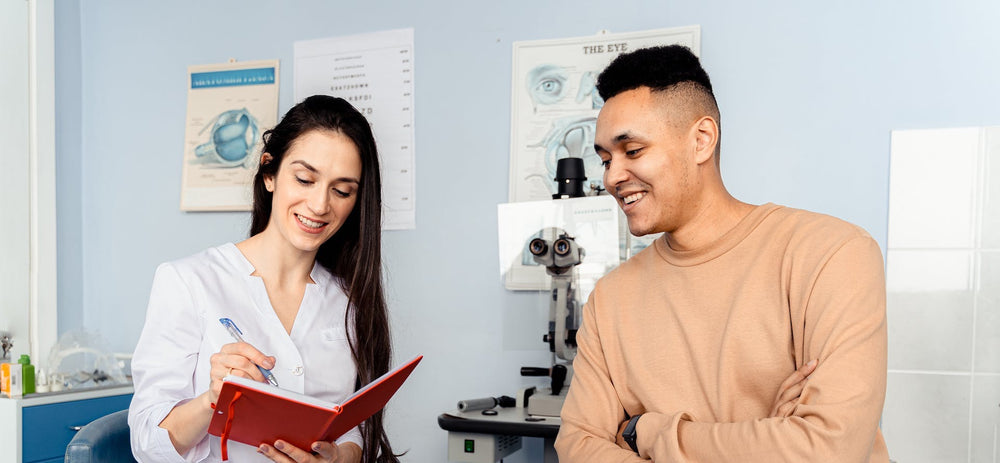 doctor talking to male patient